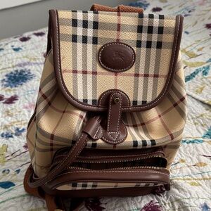 Burberry Tan and Brown Plaid Backpack
Comes with a Dust Bag